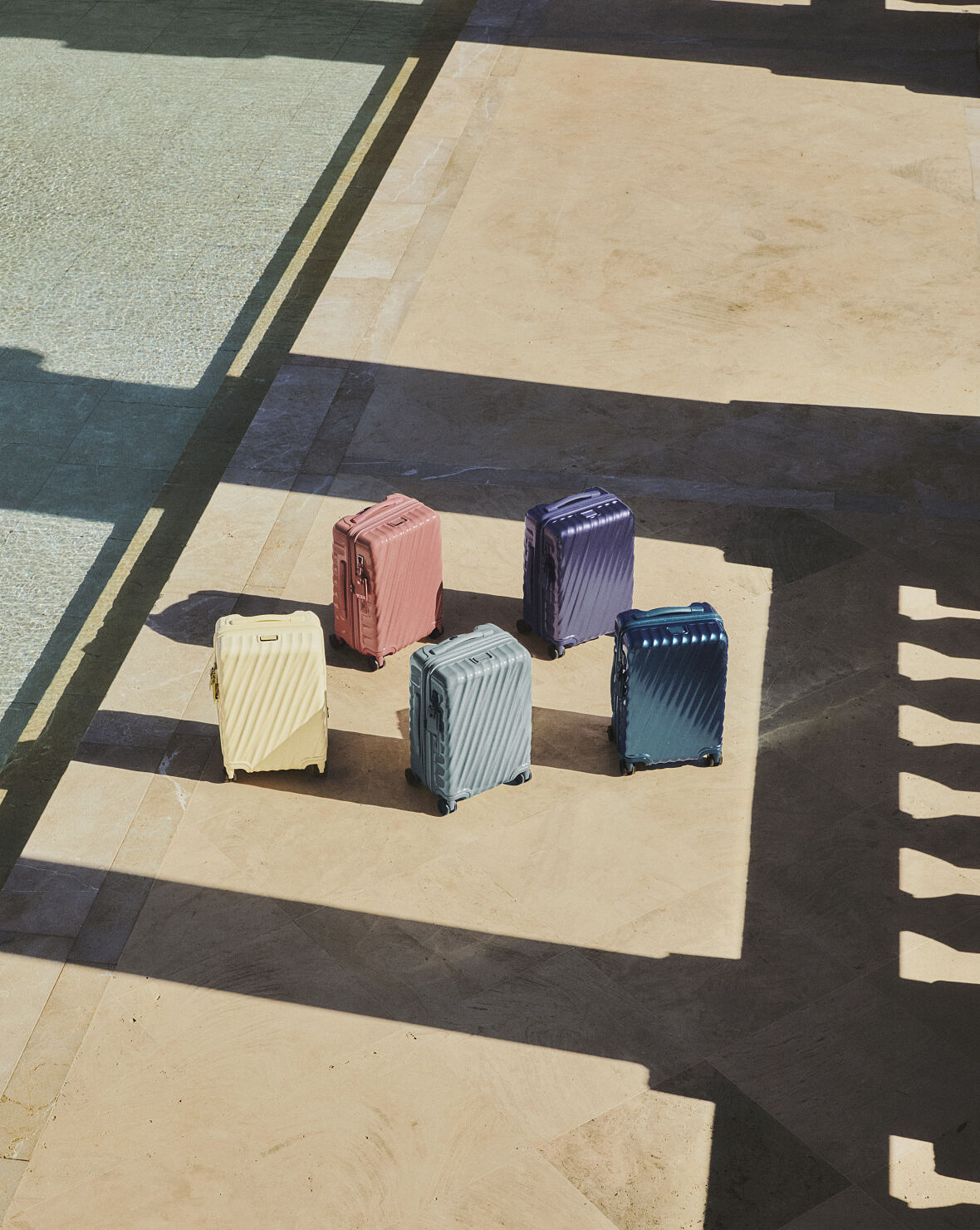 TUMI_19 Degree International Expandable 4 Whl CO_Light Blue Iridescent_Thyme_Pink Clay_washed yellow_Lilac Gray Irid_690 Euro