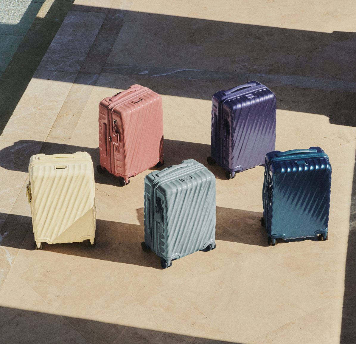 TUMI_19 Degree International Expandable 4 Whl CO_Light Blue Iridescent_Thyme_Pink Clay_washed yellow_Lilac Gray Irid_690 Euro