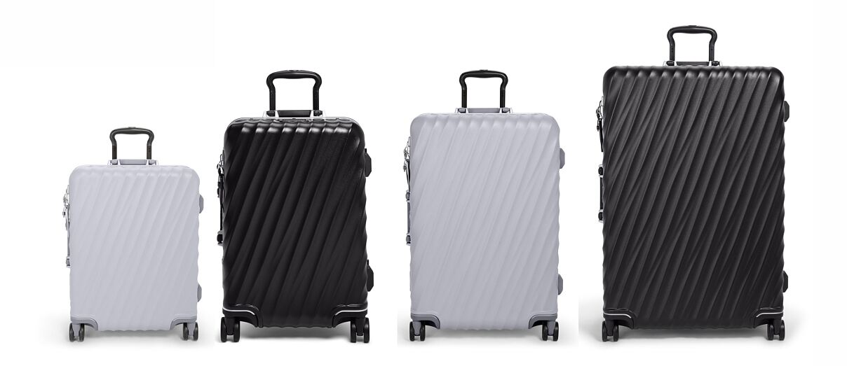 (L to R): Continental Carry-On in Pearl Grey, International Carry-On in Black Texture, Short Trip Checked Luggage in Pearl Grey and Extended Trip Checked Luggage in Black Texture.