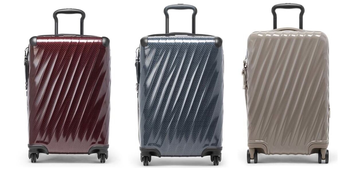 (L to R): 19 Degree Lite International 4-Wheeled Carry-On in Wine, Pavement, and Moonrock